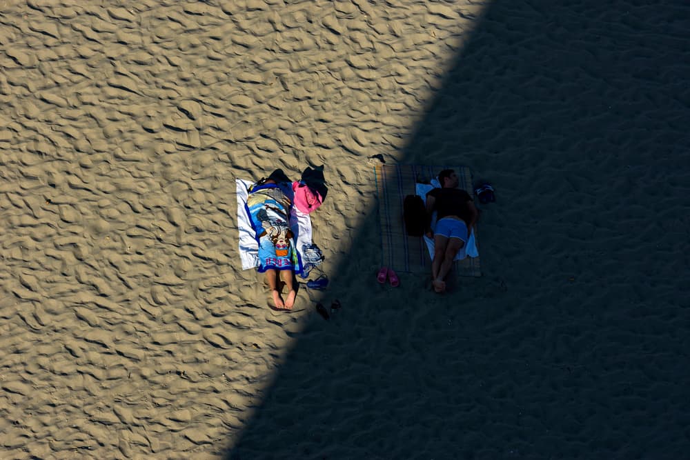 Sunbathing Beach Aerial View by Elena Raceala — canvas wall art