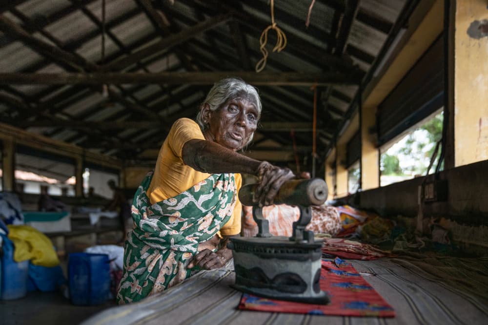 Traditional Ironing Woman by Corinne Spector — canvas wall art