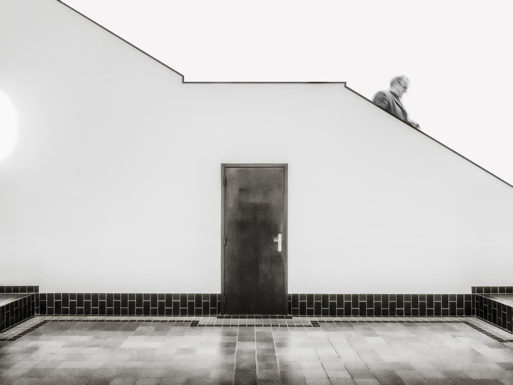 Man Descending Modern Stairs by Luc Vangindertael (laGrange) — canvas wall art