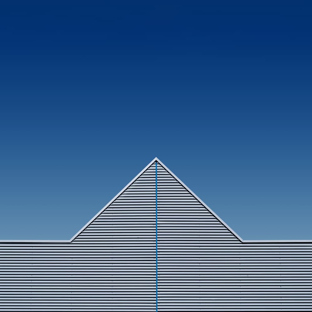 Geometric Blue Building by Rolf Endermann — canvas wall art