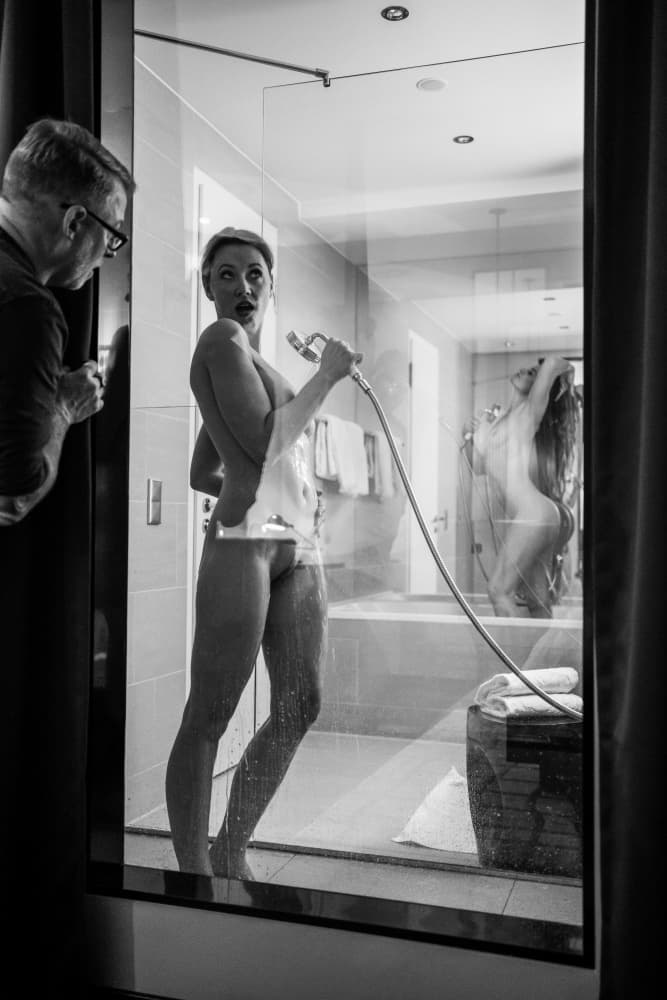 Man Watches Shower Reflection by James Graf — canvas wall art