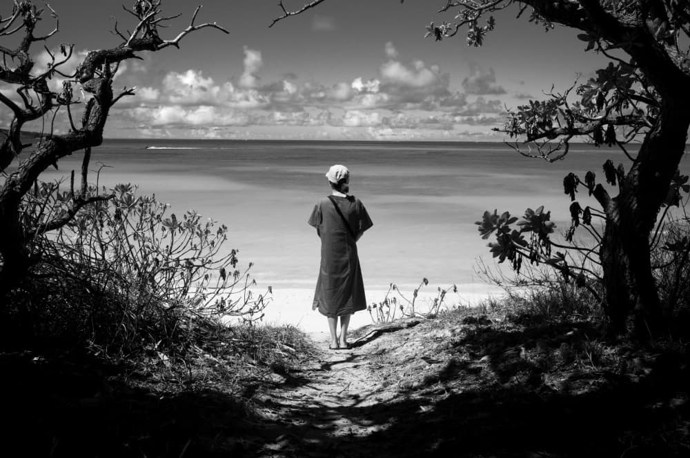 Woman Looking At Ocean by YUTAKA KURAHASHI — canvas wall art