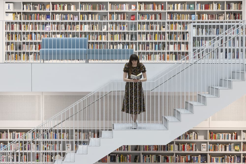 Modern Library Reading by Louise Wolbers — canvas wall art