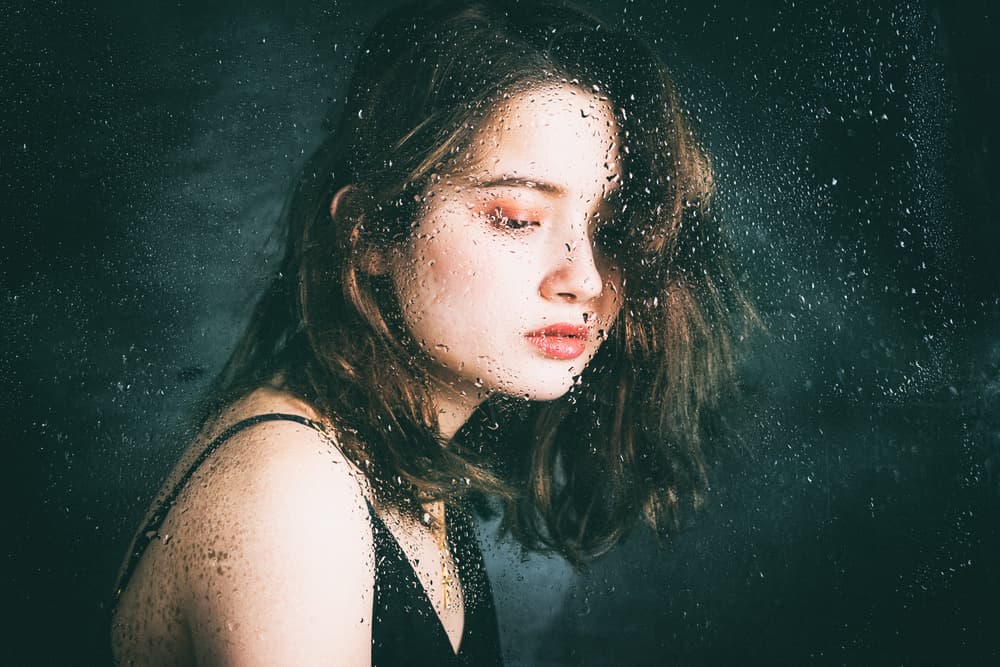 Pensive Woman Rain by Daisuke Kiyota — canvas wall art