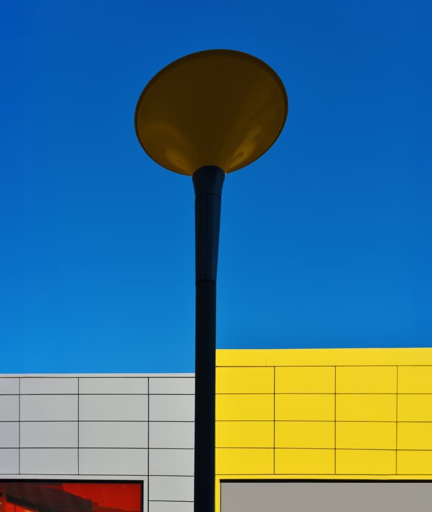 Yellow Lamppost Blue Sky by Arnon Orbach — canvas wall art