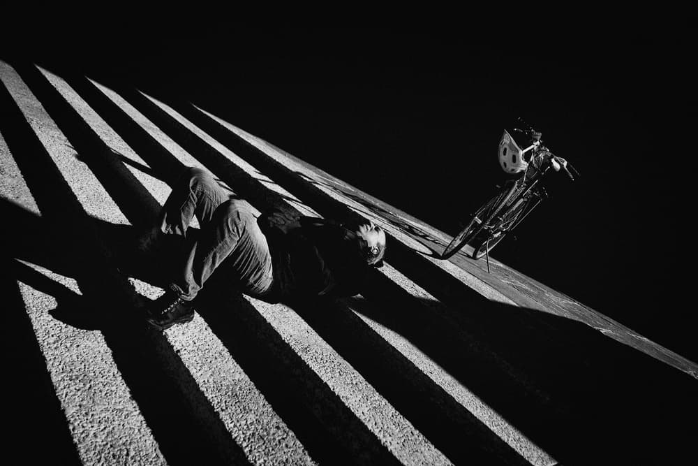 Cyclist In Striped Light by Rob Li — canvas wall art