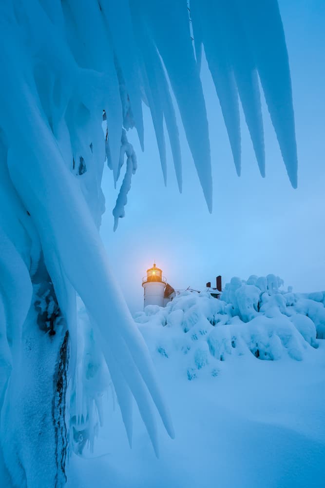 Icy Winter Lighthouse by John Fan — canvas wall art