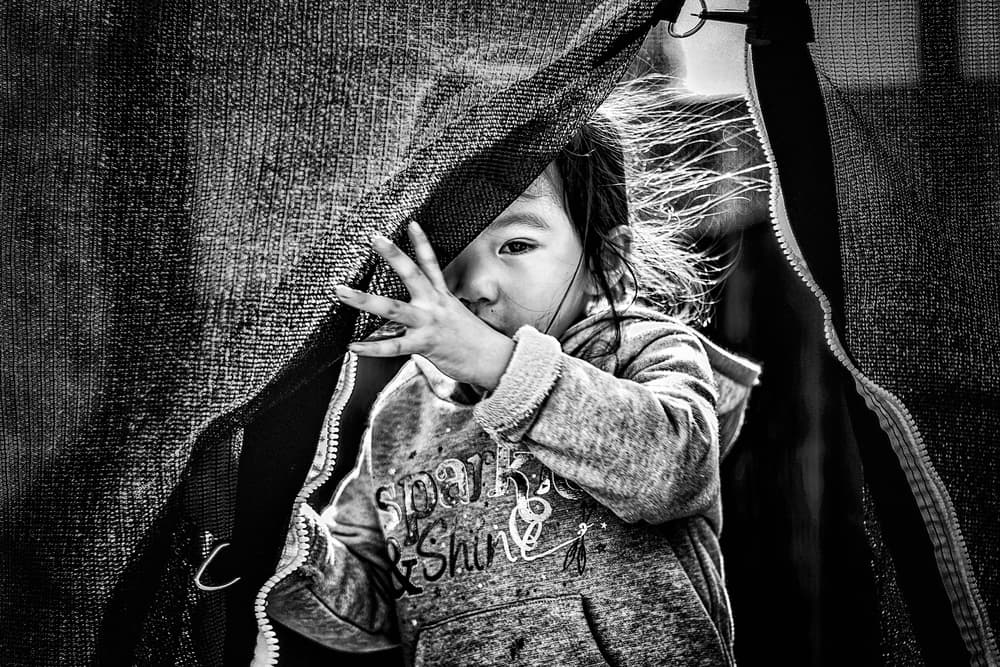 Shy Child Peeking by Despird Zhang — canvas wall art