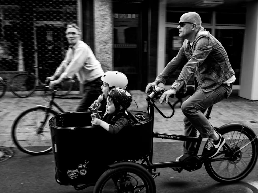 Family Cargo Bike Ride by Adam Dauria ☂ — canvas wall art