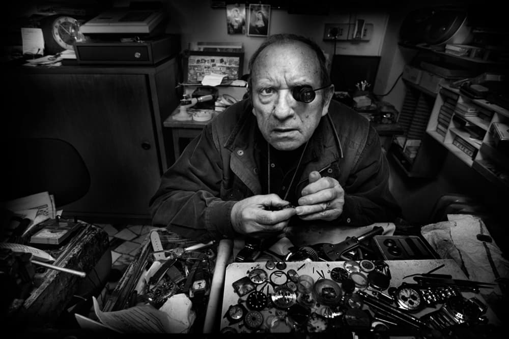 Focused Watchmaker by Antonio Grambone — canvas wall art