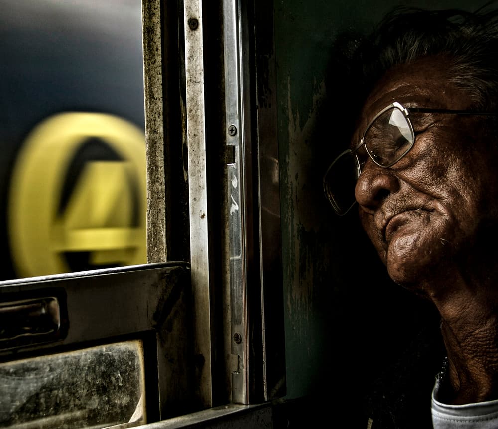 Pensive Man Train Window by Erik Schottstaedt — canvas wall art