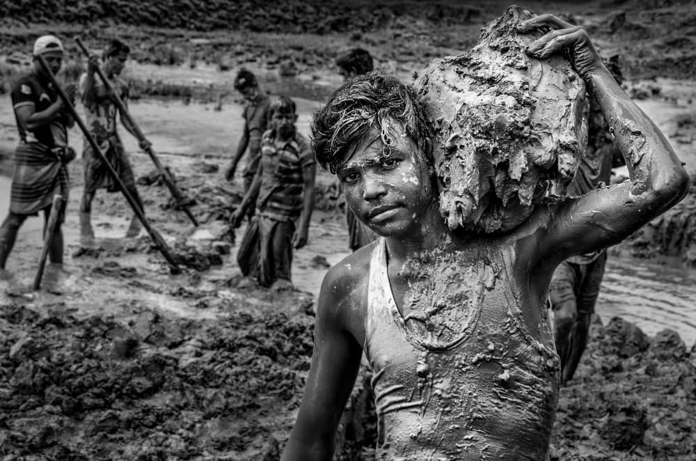 Young Laborer's Muddy Gaze by Joxe Inazio Kuesta Garmendia — canvas wall art