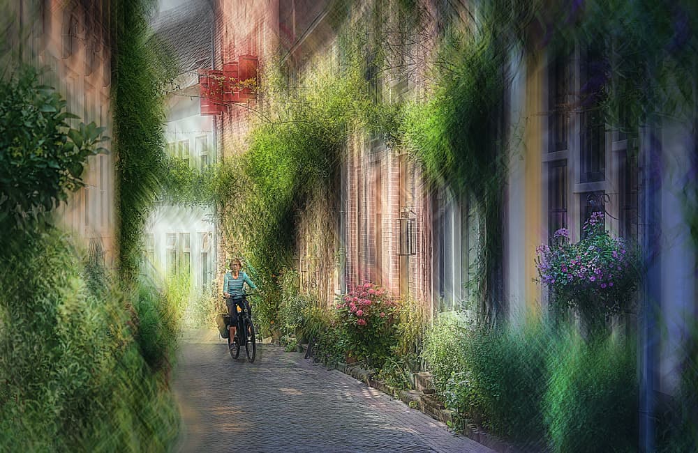 Dreamy Alley Bike Ride by Jan van der Linden — canvas wall art
