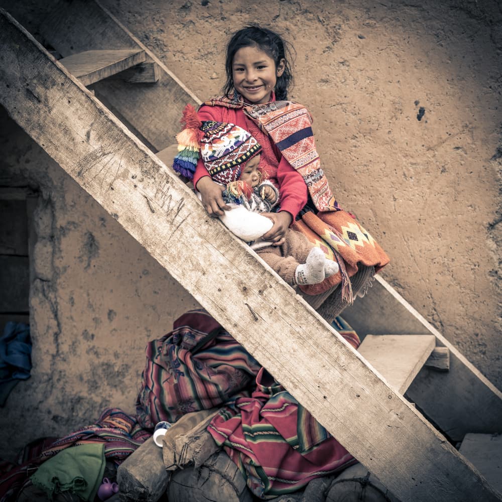 Andean Girl with Doll by Eyal Alcalay — canvas wall art