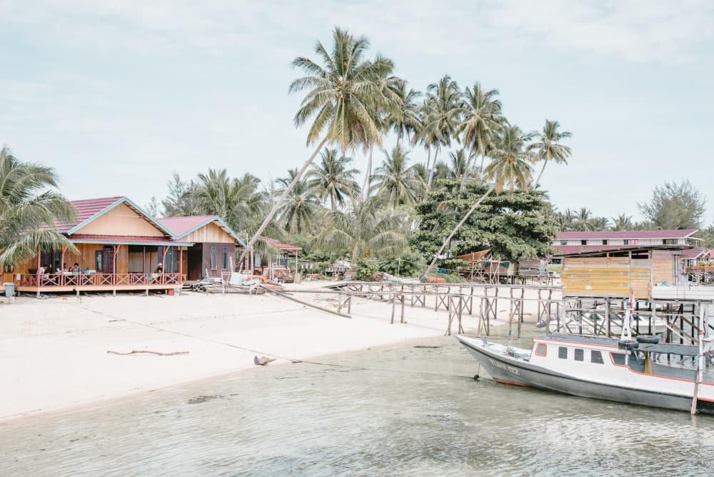 Tropical Beachfront Village by Photolovers — canvas wall art
