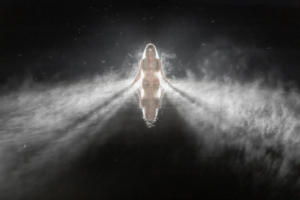 Glowing Woman Serene Water by Leszek Paradowski — canvas wall art