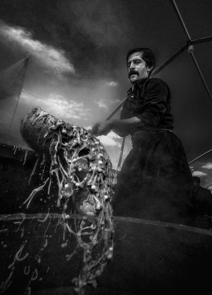 Focused Artisan Stirring by Babak Mehrafshar — canvas wall art