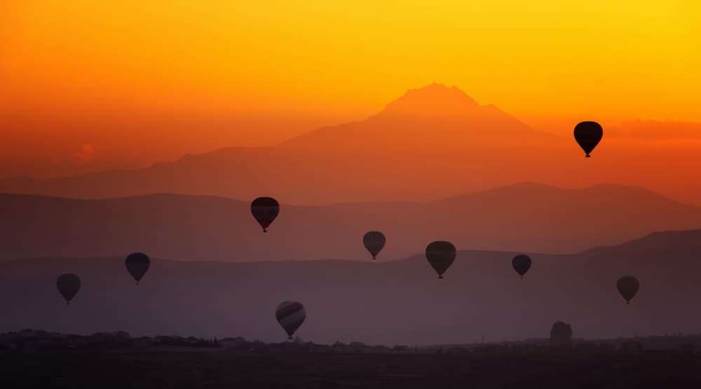 Sunrise Hot Air Balloons by Merthan Kortan — canvas wall art
