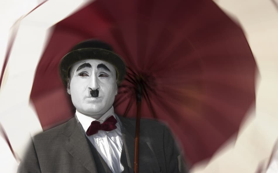 Pensive Mime With Umbrella by Milan Malovrh — canvas wall art