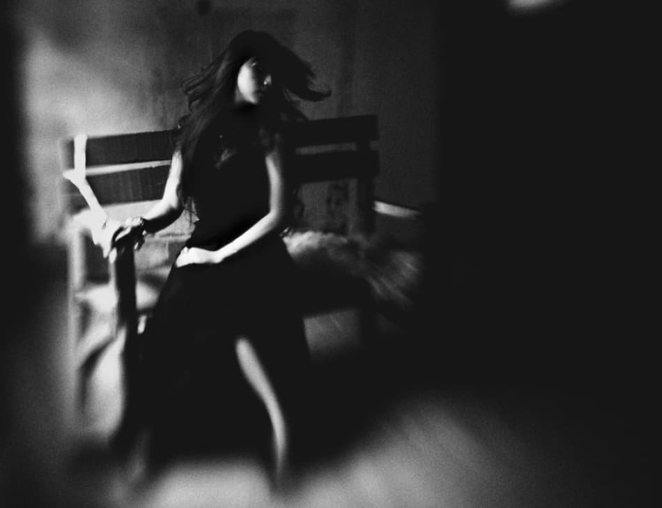 Pensive Woman In Shadow by Hari Sulistiawan — canvas wall art