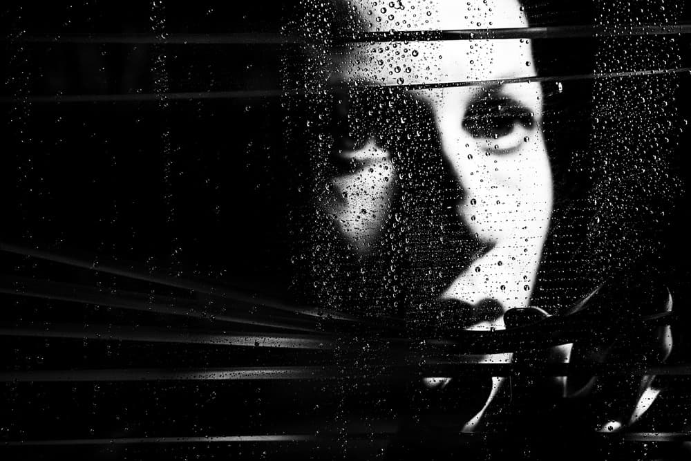 Hidden Gaze Rainy Window by Amnon Eichelberg — canvas wall art