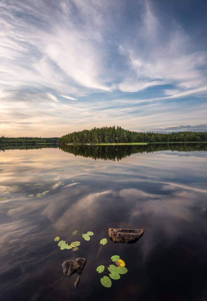 Serene Lake Reflection by Christian Lindsten — canvas wall art