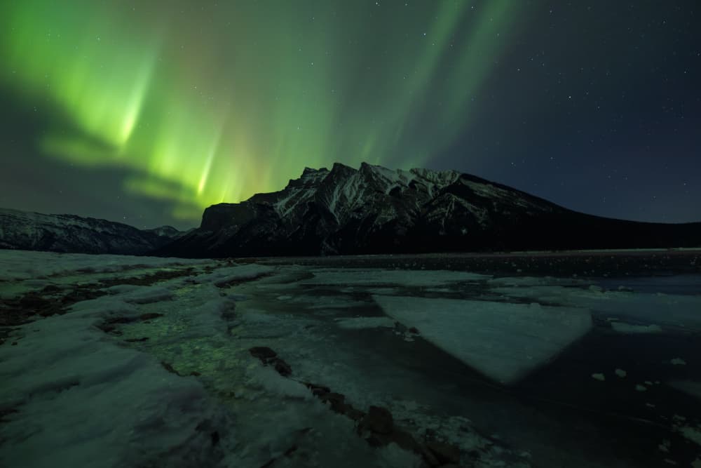 Northern Lights Winter Landscape by Jenny L. Zhang — canvas wall art