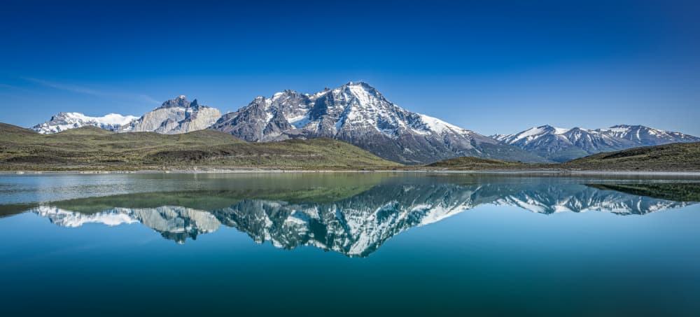 Snowy Mountain Lake Reflection by Jeffrey C. Sink — canvas wall art
