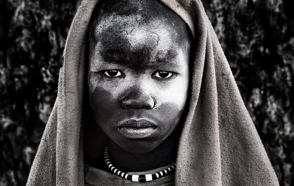Intense Child Gaze by Joxe Inazio Kuesta Garmendia — canvas wall art