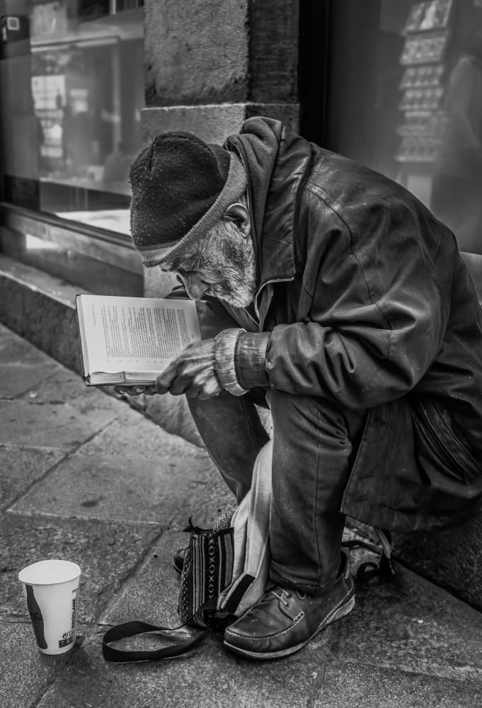 Thoughtful Man Reading by PacodlaCorte — canvas wall art