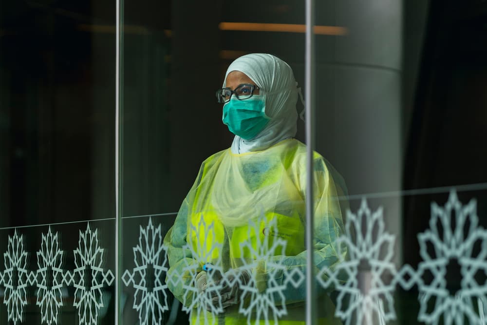Masked Healthcare Worker by Haitham AL Farsi — canvas wall art