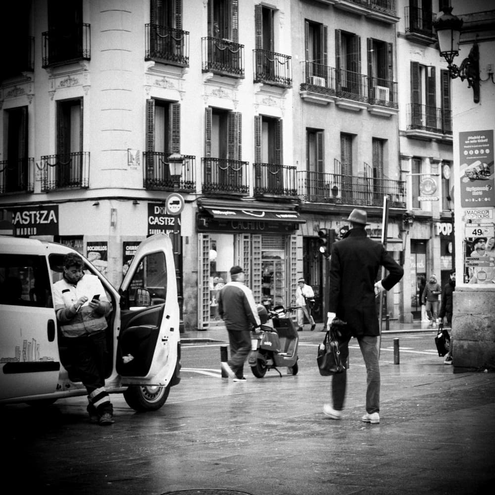 Monochrome Street Life by Milena Seita — canvas wall art