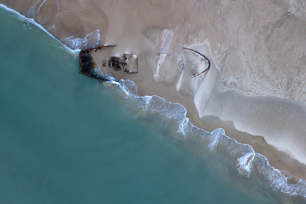 Aerial Shipwreck Beach by Eyal Amer — canvas wall art