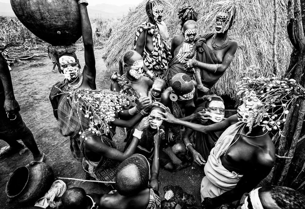 African Tribal Gathering by Joxe Inazio Kuesta Garmendia — canvas wall art