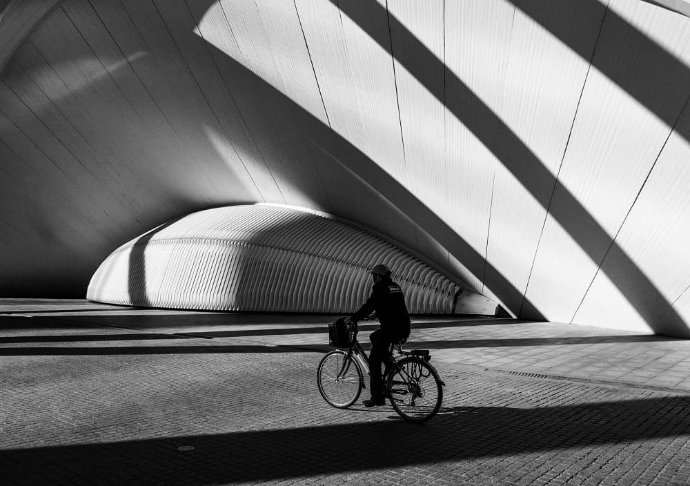 Curved Shadows Cyclist by Adolfo Urrutia — canvas wall art