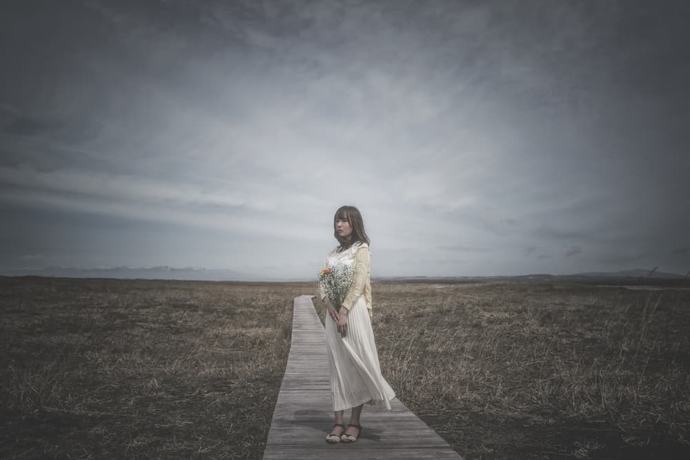 Lone Woman Open Field by Nobu Ishijima — canvas wall art