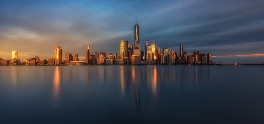 Golden City Reflections by David Martin Castan — canvas wall art