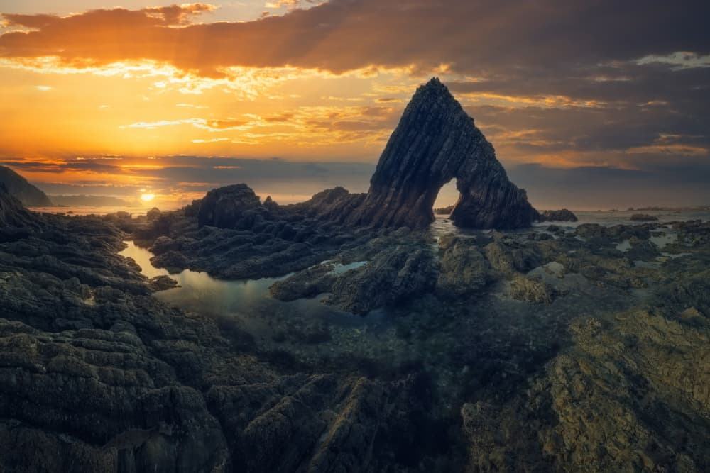 Golden Coastal Arch Sunset by David Martin Castan — canvas wall art