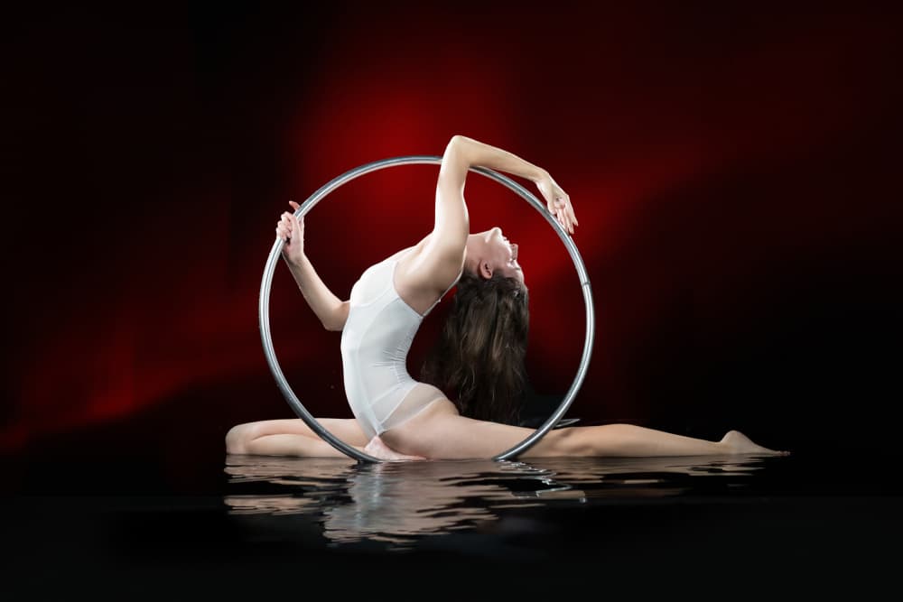 Hoop Acrobat In Water by Songlin Xu — canvas wall art
