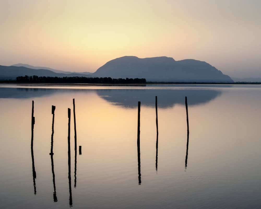 Serene Mountain Water Posts by George Digalakis — canvas wall art