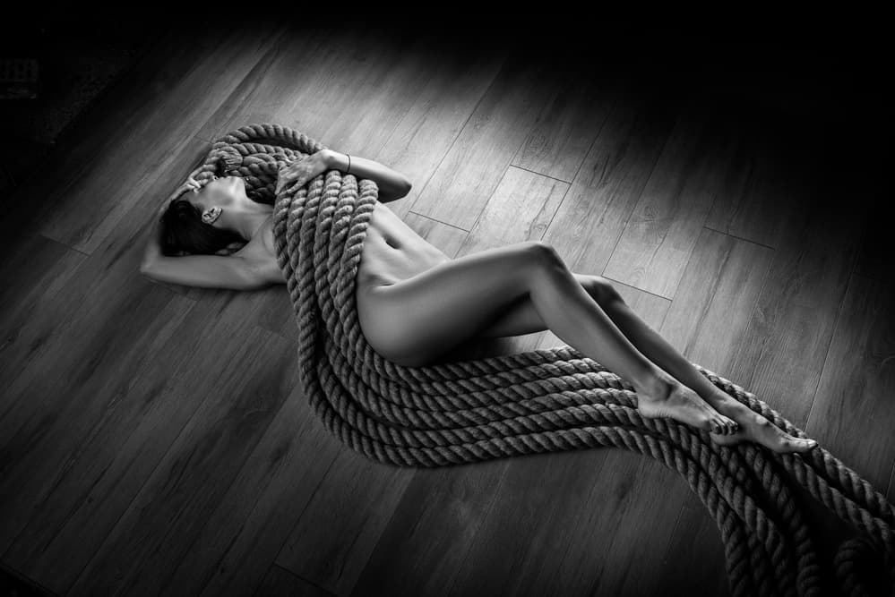 Woman Entwined Rope by AURIMAS VALEVICIUS — canvas wall art