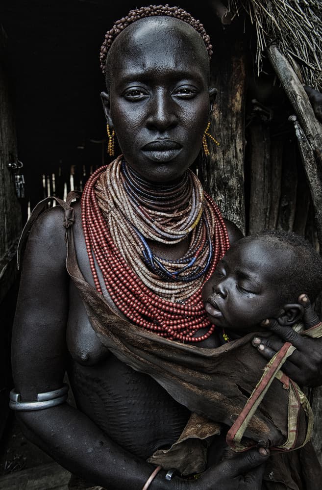 African Mother and Child by Joxe Inazio Kuesta Garmendia — canvas wall art