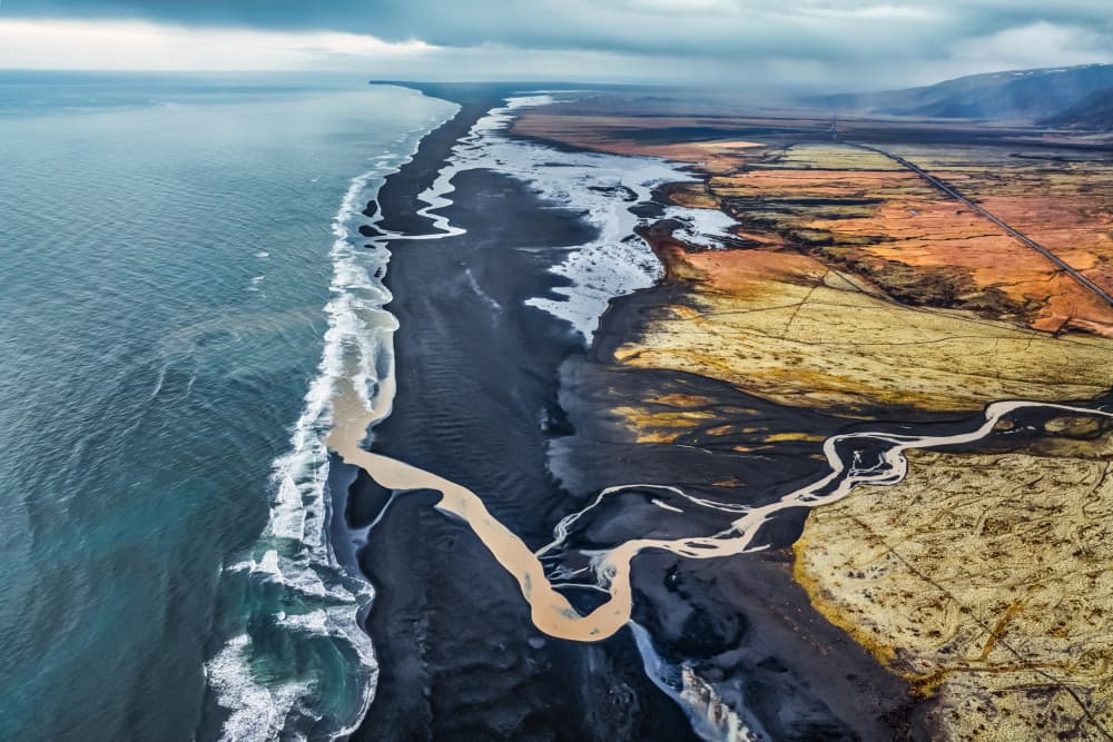 Winding River Black Sands by Jacek Swiercz — canvas wall art