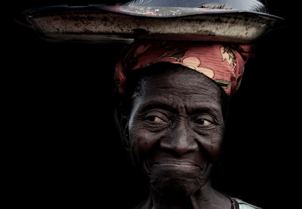 Thoughtful African Woman by Elena Molina — canvas wall art