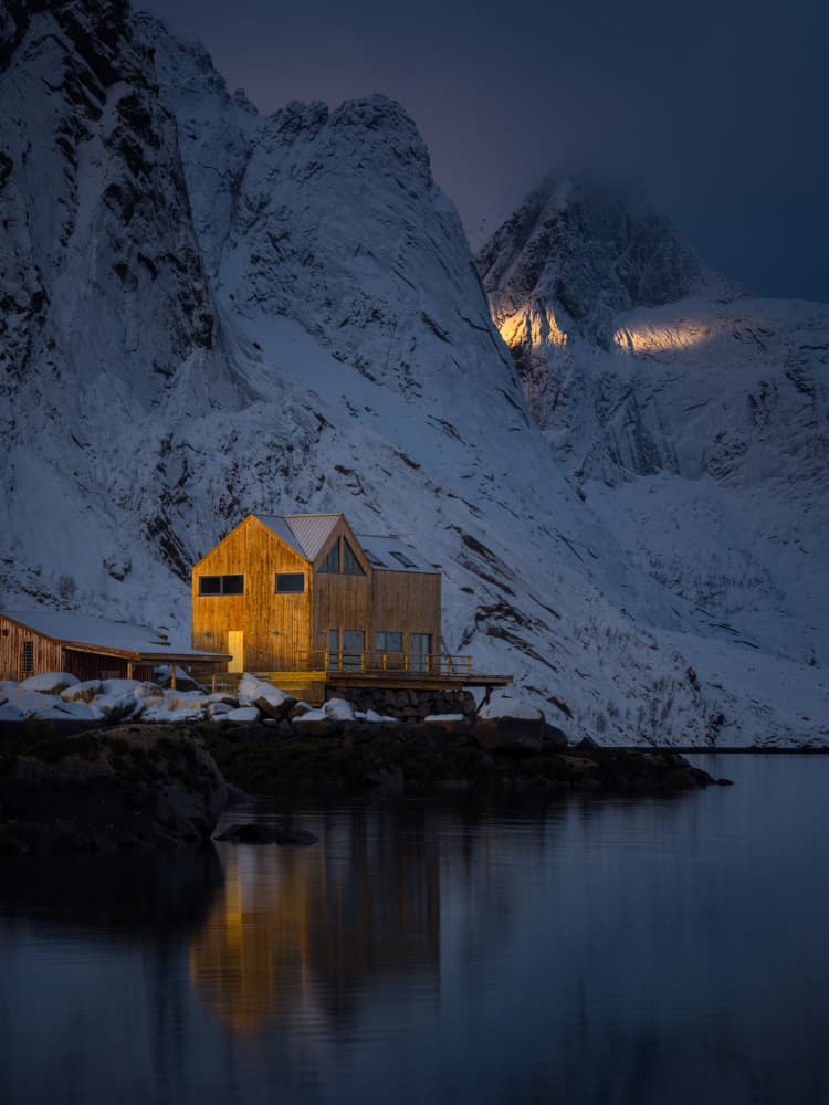 Nordic Cabin Winter Glow by Radek Pohnan — canvas wall art