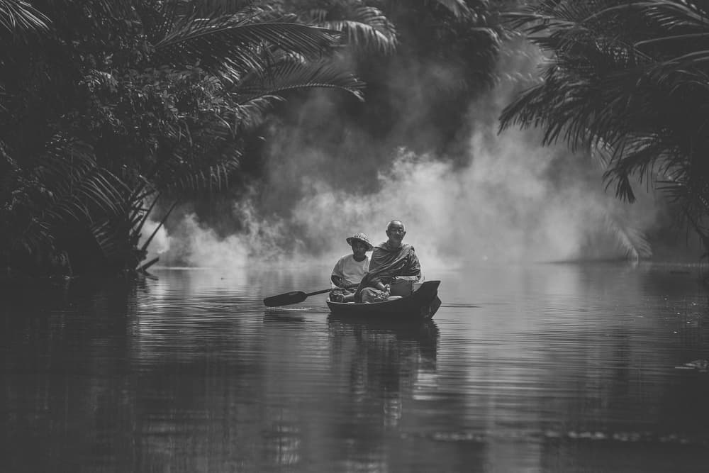 Monk's Misty River Journey by ADIREK M — canvas wall art