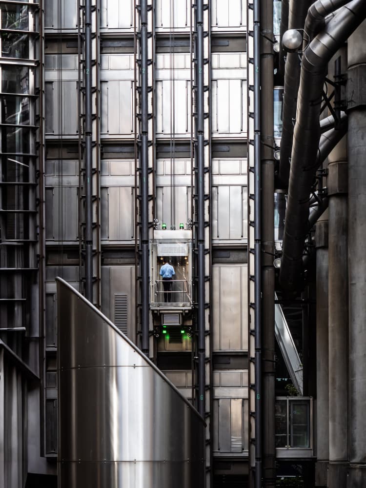Man Rides Glass Elevator by IKUMI FUKAZAWA — canvas wall art