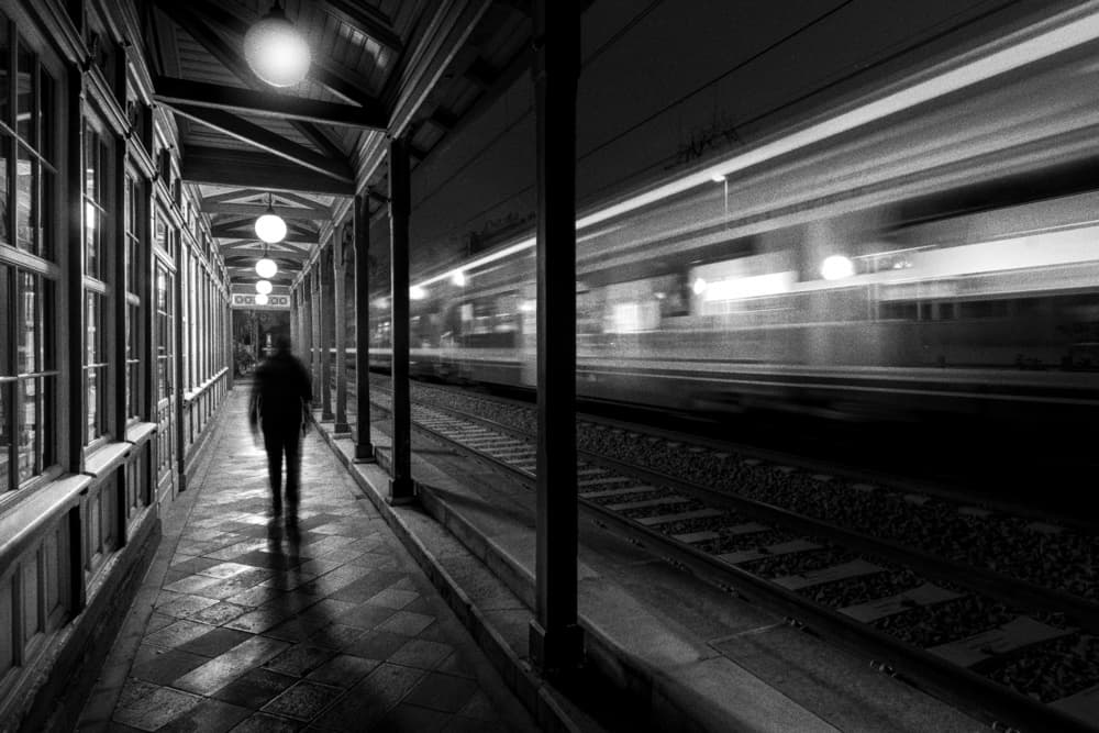 Lonely Figure Train Station by Andrea Comari — canvas wall art