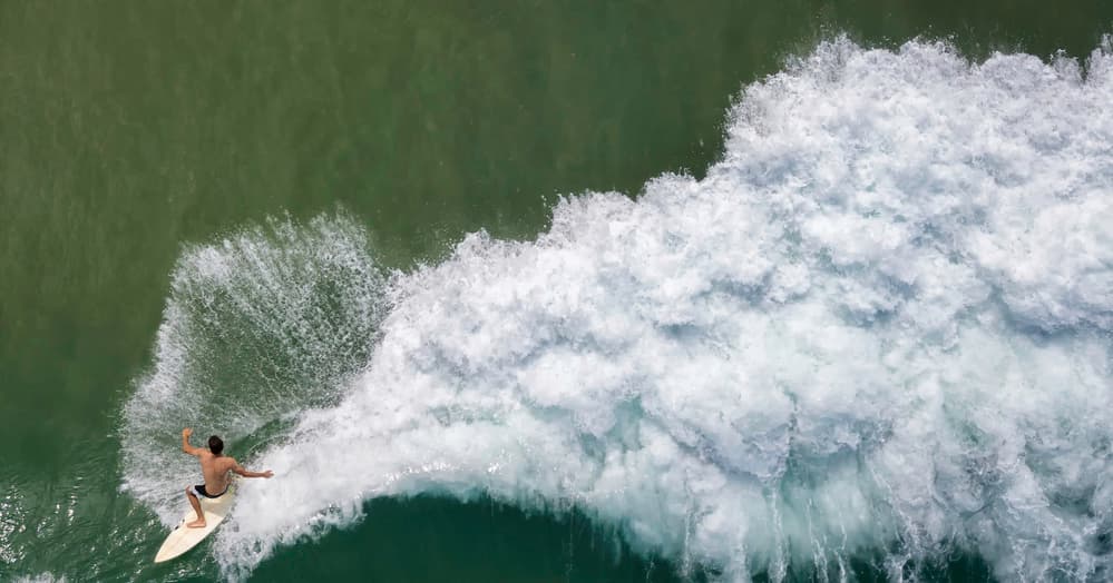 Surfer Riding Green Wave by Ido Meirovich — canvas wall art