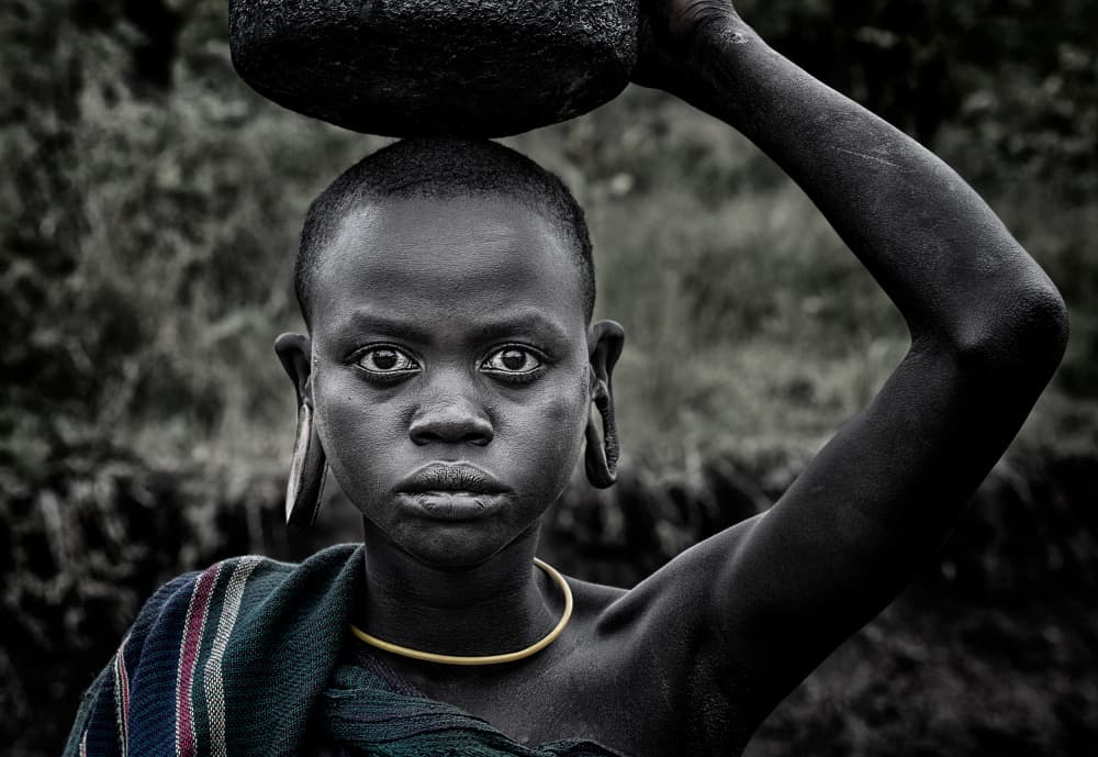 Resilient African Woman by Joxe Inazio Kuesta Garmendia — canvas wall art
